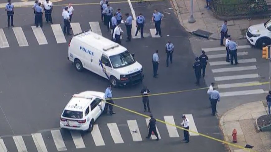 Philadelphia police officer in critical condition after shooting erupts outside high school